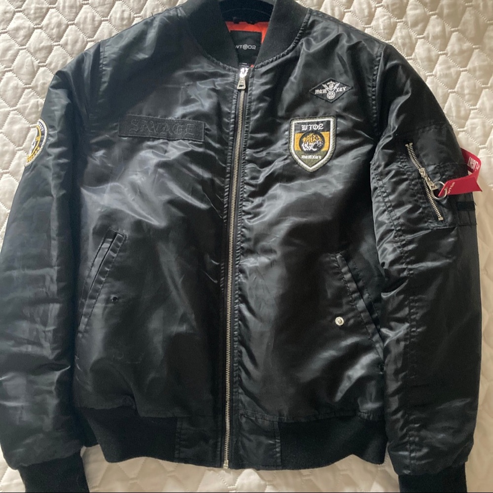 Black savage puffer jacket with orange interior design - Unisex